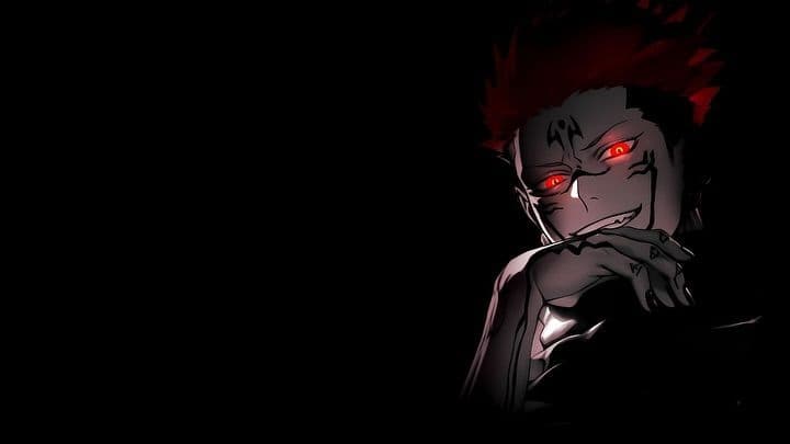 The image features a male character with spiky pinkish-red hair and distinct black markings across his face and hands, characteristic of Ryomen Sukuna. He is depicted in a seated or leaning pose, resting his chin on the back of his hand while looking directly at the viewer with a menacing, confident smirk. The character is set against a void of absolute darkness, with only his upper torso and face illuminated by a sharp, dramatic light source. The artistic technique utilizes high-contrast chiaroscuro, emphasizing the glowing red pupils of his eyes and the sharp lines of his facial tattoos. The overall atmosphere is dark, intimidating, and intense, conveying a sense of overwhelming power and malice.
