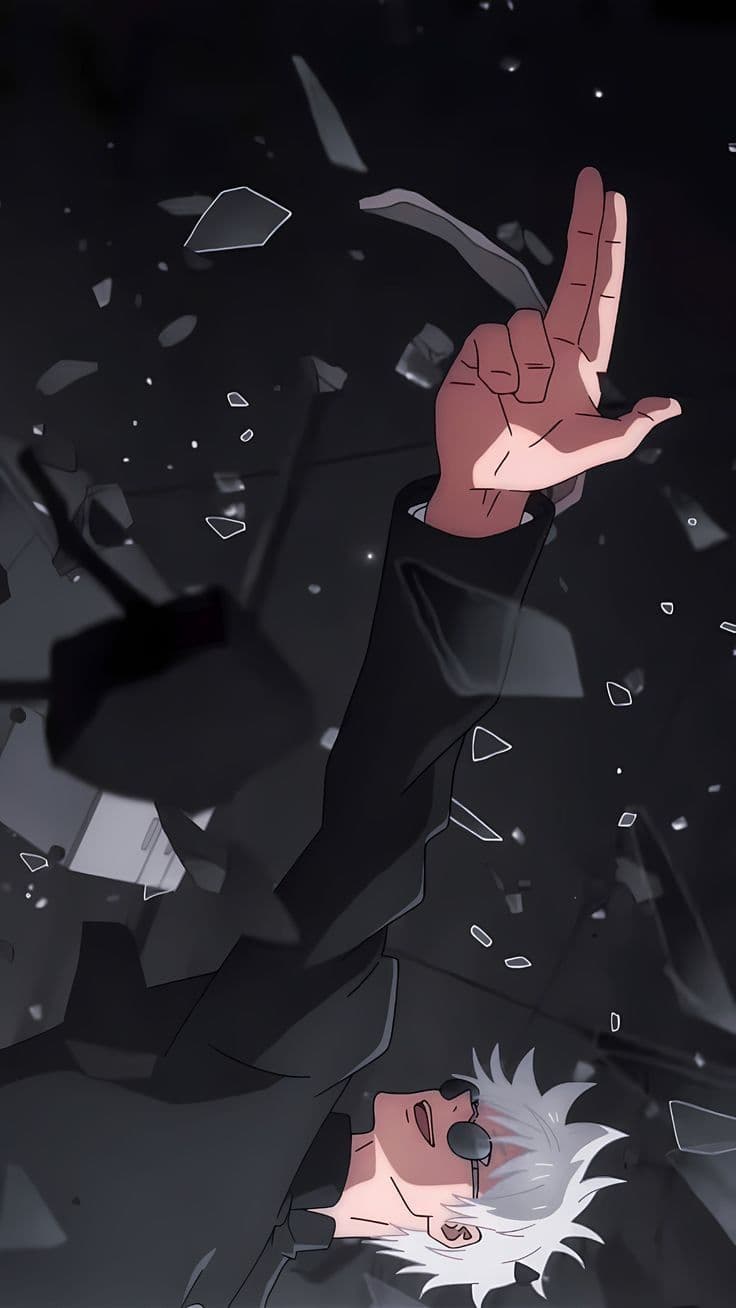 The image features a male character with spiky white hair and dark round sunglasses, identified as Satoru Gojo from Jujutsu Kaisen. He is wearing a high-collared, long-sleeved black uniform that provides full coverage. The character is depicted in a dynamic, falling or floating pose with one arm extended upward, fingers positioned in a specific ritualistic gesture. The background is a dark, void-like space filled with numerous shards of shattered glass or debris, creating a sense of chaotic motion. The artistic style utilizes sharp line work and clean cel-shading typical of modern high-budget TV anime. The overall atmosphere is intense and supernatural, conveying a sense of powerful calm amidst a destructive environment.