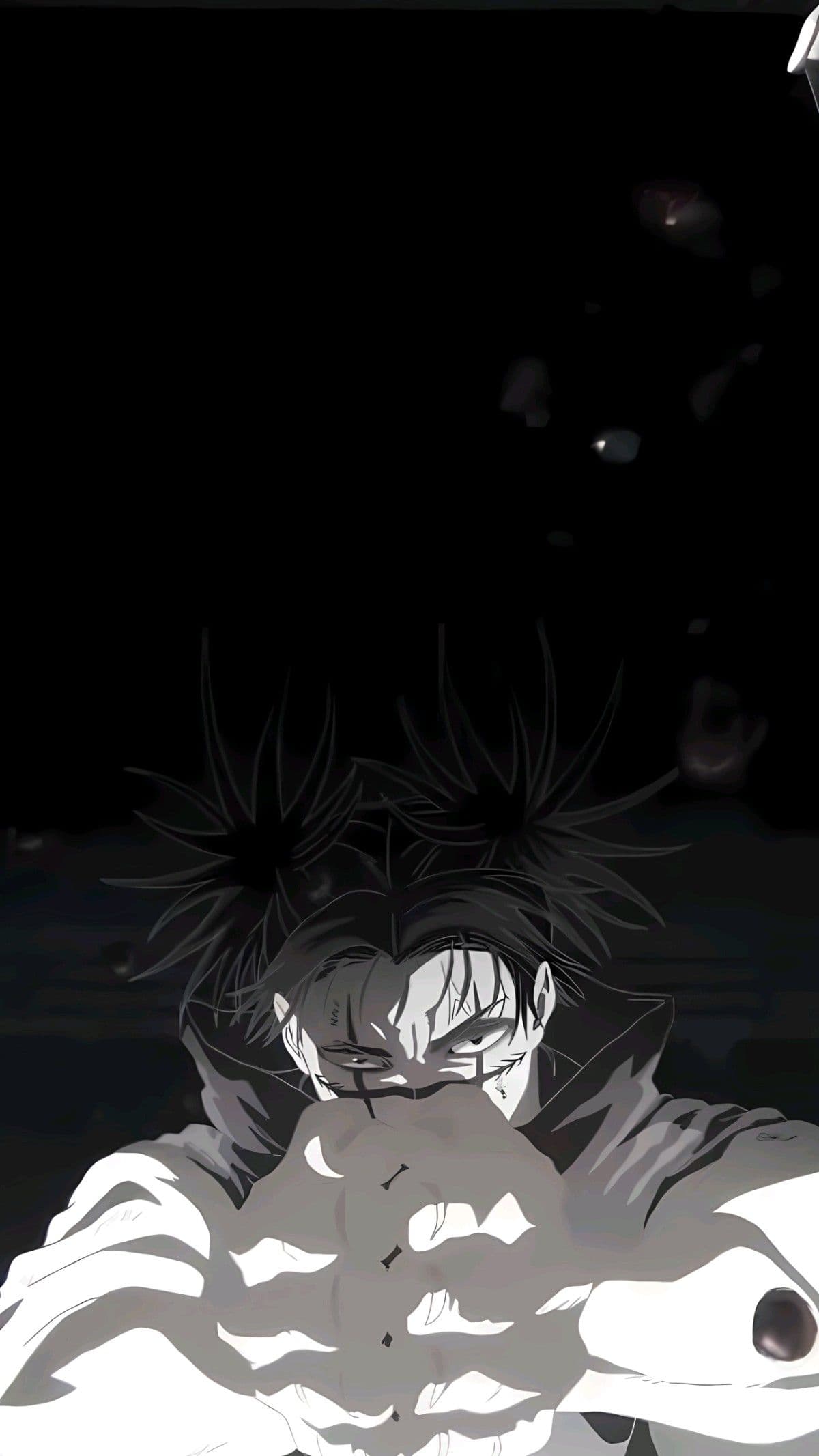 The image features the character Choso from Jujutsu Kaisen in a high-contrast, monochrome digital art style. He is depicted from a low angle, looking directly at the viewer with an intense, focused expression while holding his hands together in a specific combat stance. He wears his signature high-collared dark robe over a light-colored garment, with his unique twin-tail hairstyle prominently displayed. The background is almost entirely black, creating a stark void that emphasizes the character's silhouette and the dramatic lighting. The artistic technique utilizes sharp cel-shading and heavy ink-like shadows to create a sense of depth and menace. The overall atmosphere is dark, tense, and powerful, capturing a moment of high emotional intensity and supernatural focus.
