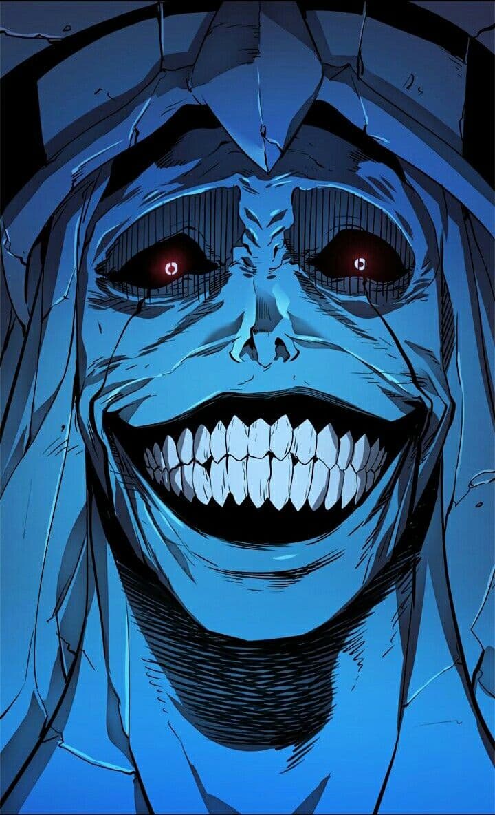 The image features a close-up, high-angle shot of the 'God Statue' from the series Solo Leveling, characterized by its massive, stone-like appearance and a terrifyingly wide, toothy grin. The subject is a colossal entity with cracked, blue-toned skin and glowing red pupils set within deep, dark eye sockets. It wears a crown-like stone headpiece, and its face is etched with numerous fine lines and wrinkles that emphasize its unsettling expression. The pose is a static but menacing stare directed straight at the viewer, creating an intense psychological impact. The artistic technique utilizes sharp, clean line work and dramatic cel shading to create a sense of depth and dread. The overall atmosphere is dark, malevolent, and highly tense, evoking a feeling of overwhelming power and horror.