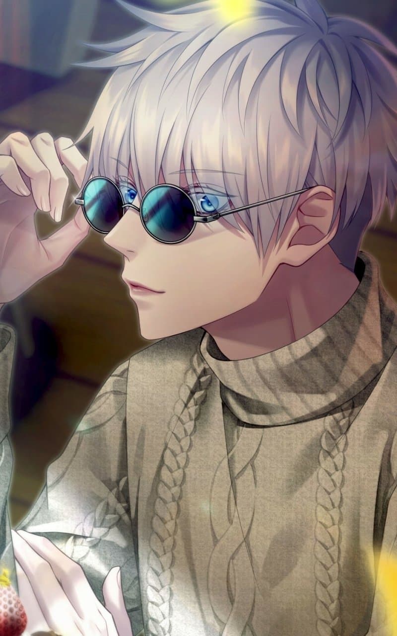 The image features a young man with striking white, spiky hair and vibrant blue eyes, characteristic of the character Satoru Gojo. He is dressed modestly in a thick, beige cable-knit turtleneck sweater that provides full coverage. The subject is captured in a side profile, mid-adjustment of his signature round dark sunglasses, revealing one eye. The setting appears to be a cozy indoor environment with soft, warm lighting that creates a gentle glow on his features and the texture of his clothing. The artistic technique utilizes clean digital lines combined with soft, painterly shading to emphasize the depth of the sweater's knit and the luminosity of his hair. The overall atmosphere is peaceful and contemplative, leaning into a casual, 'slice-of-life' aesthetic rather than his typical combat-ready persona.